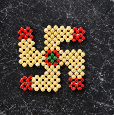 Handcrafted Moti Swastik for Home & Temple Decor